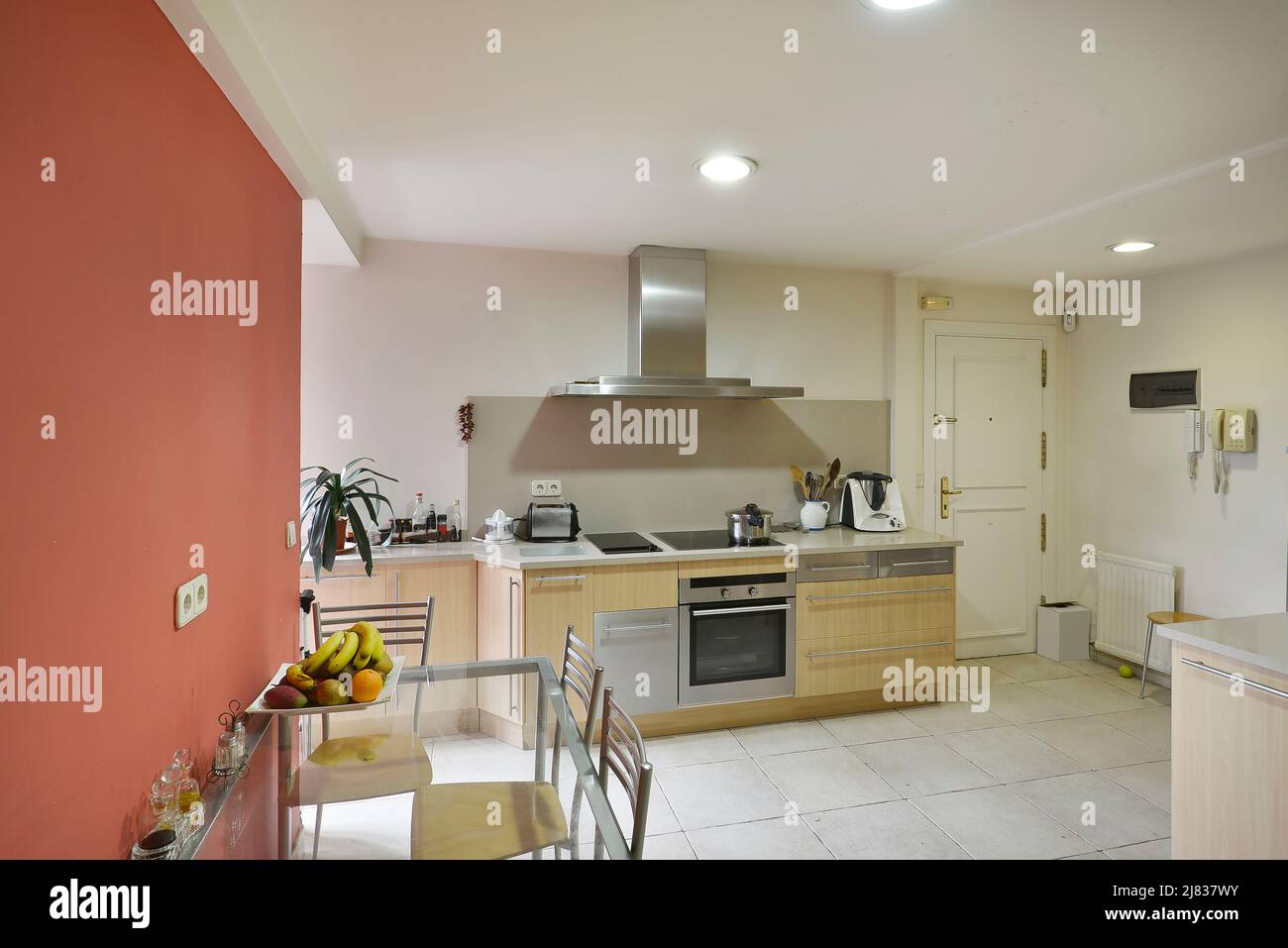 full kitchen with stainless steel appliances, matching washing machine