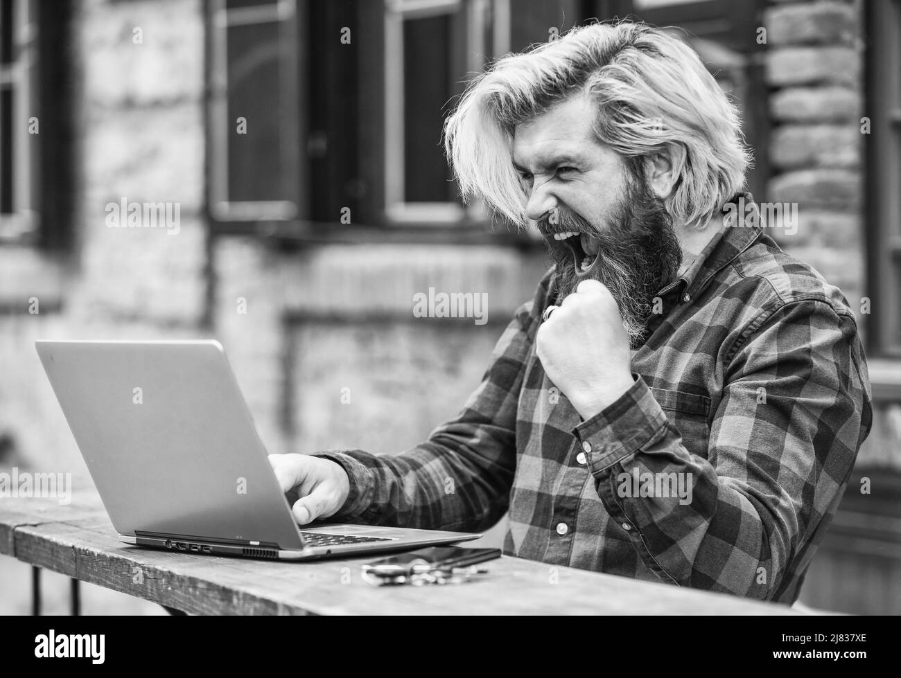 Modern communication. Risky shopping. Stock trader. Online business. Online entrepreneur working outdoors. Man busy work with laptop. Businessman Stock Photo