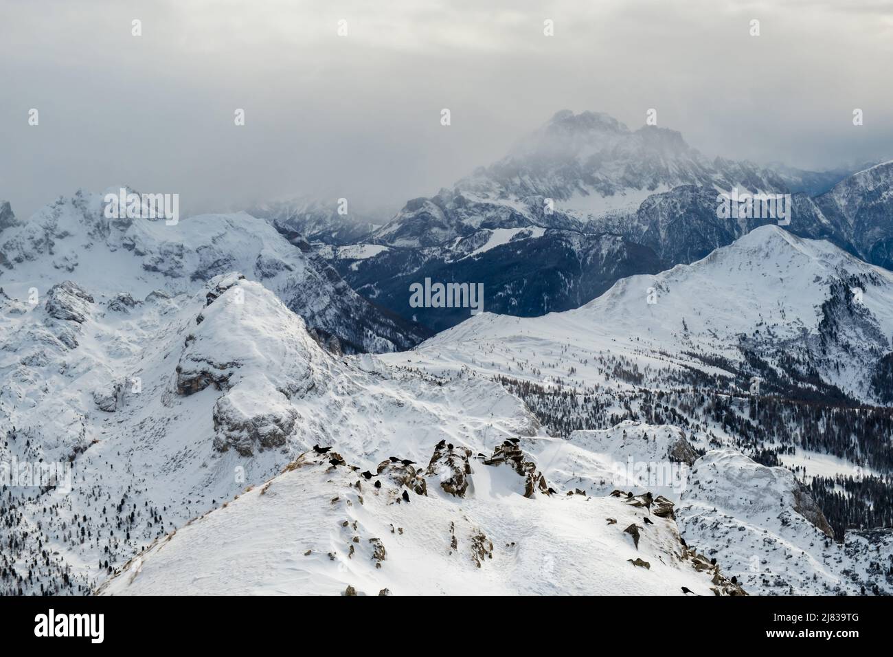 Clouds carrying snow in the italian alps Stock Photo - Alamy