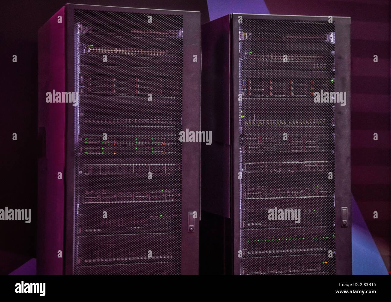 A close-up photo of two black server racks Stock Photo