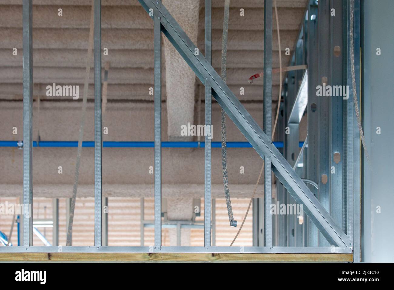 Interior wall prepared with galvanized steel framing for drywall