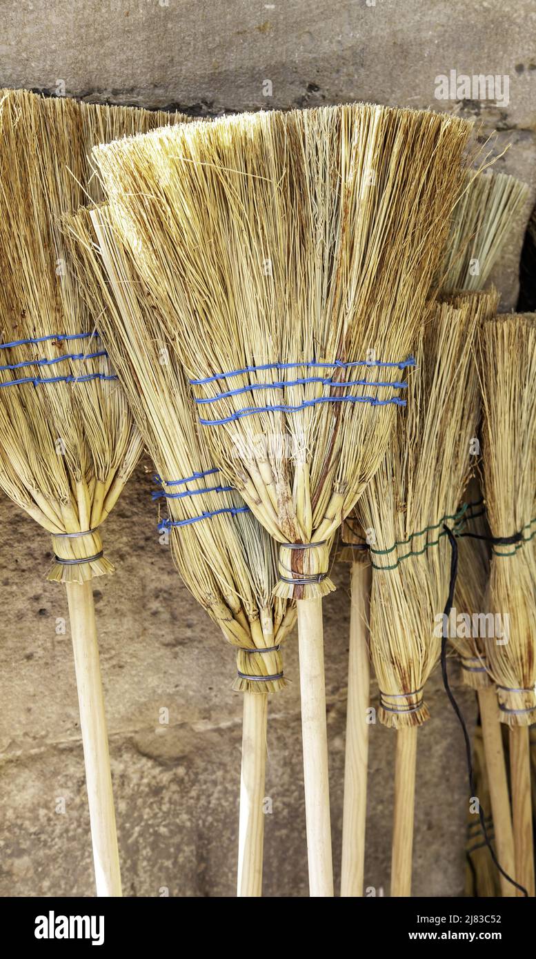 Esparto brooms ancient witches, cleaning objects Stock Photo