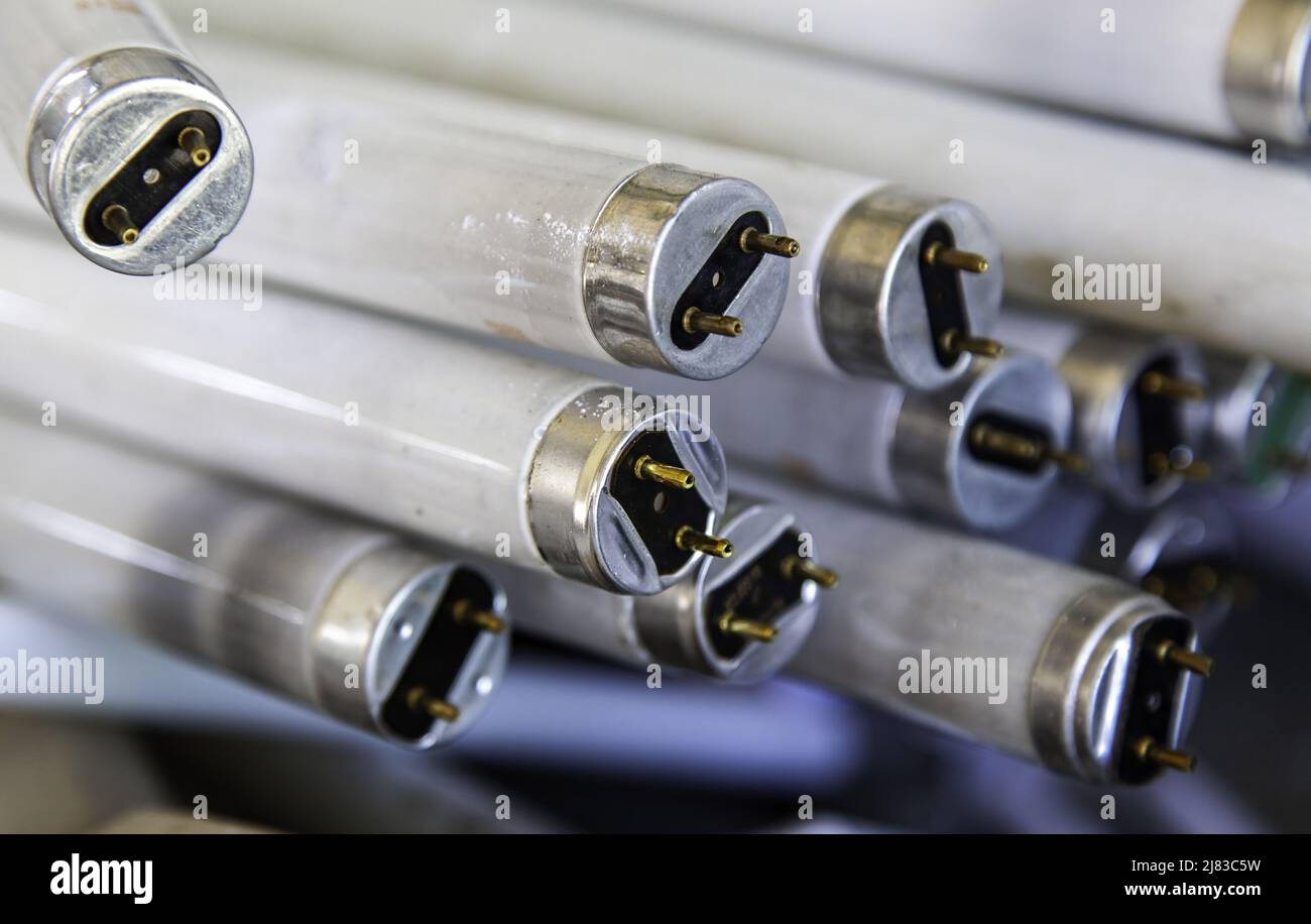 Broken light fluorescents in recycling company, environment Stock Photo