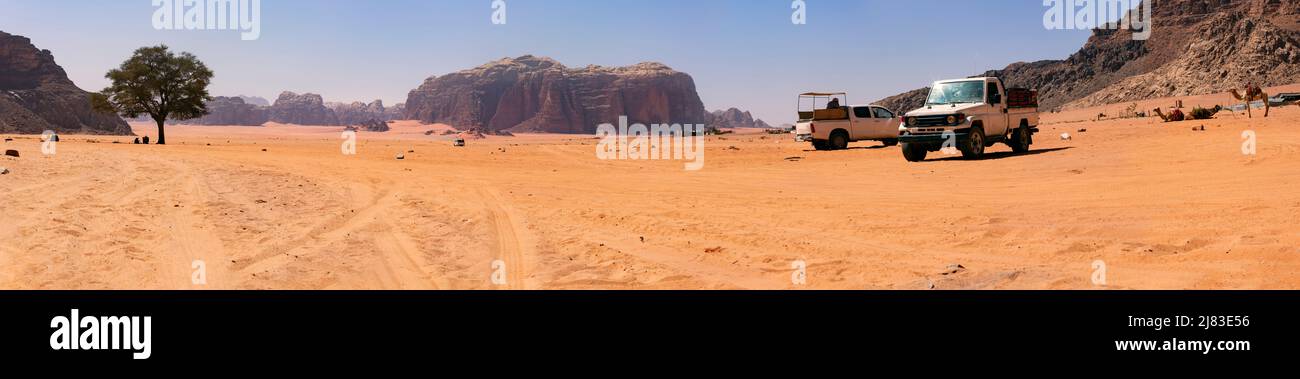Jordanian desert at Lawrence's Spring in Wadi Rum, Jordan. Wadi Rum is known as The Valley of the Moon and a UNESCO World Heritage Site. Stock Photo