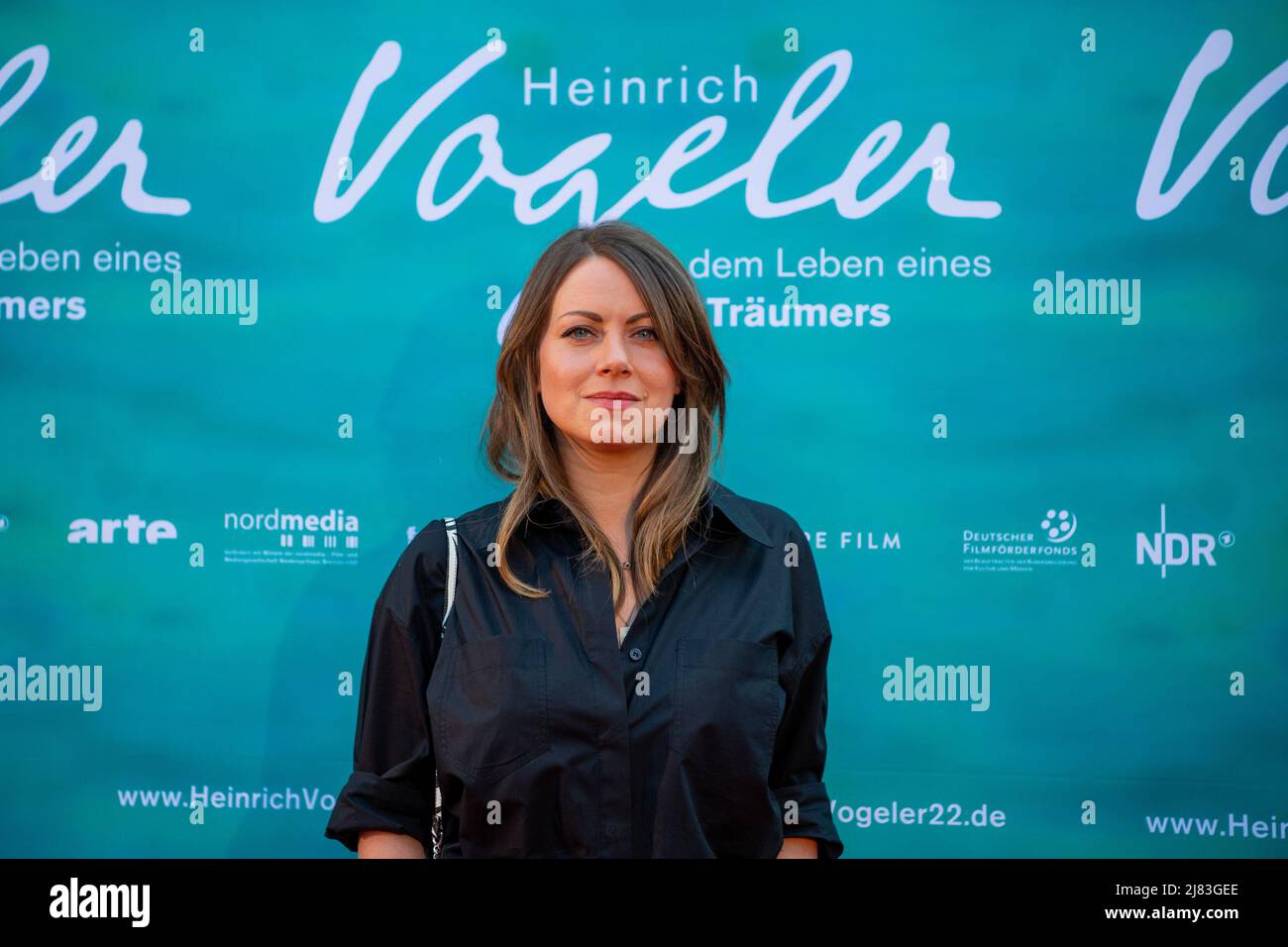 Bremen, Germany. 12th May, 2022. Alice Dwyer, actress comes to the premiere of the feature film 'Heinrich Vogeler - From the life of a dreamer'. Bremen-born artist Heinrich Vogeler (1872-1942) worked as a painter, graphic artist, designer, architect and writer. The film focuses on his biography and features Vogeler's descendants as well as contemporary German and French artists and historians. Credit: Sina Schuldt/dpa/Alamy Live News Stock Photo
