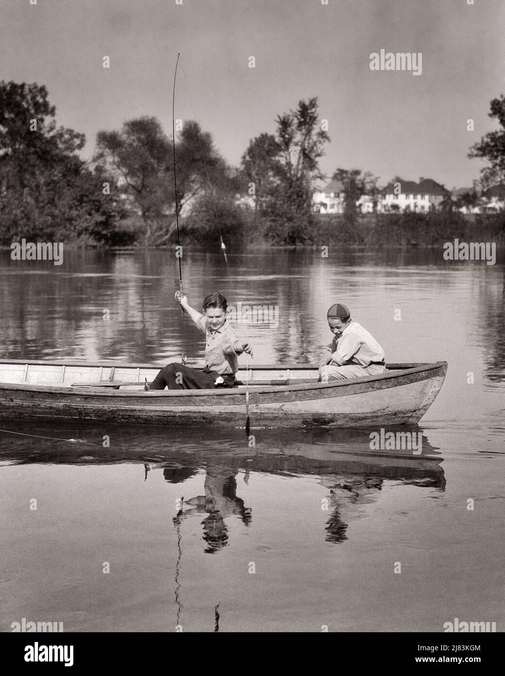 Retro child fishing Black and White Stock Photos & Images - Alamy