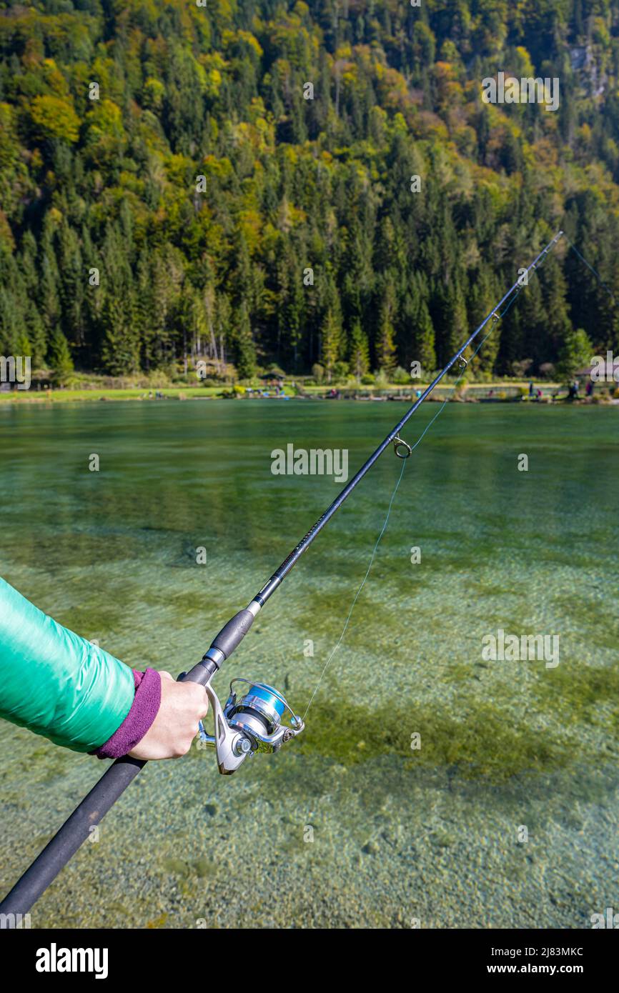 Fishing at a small pond, fishing rod Stock Photo