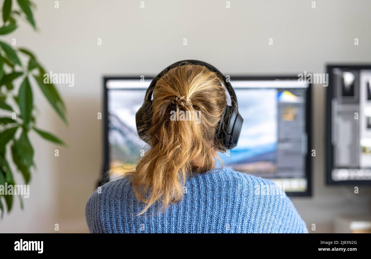 Young woman working on a computer Stock Photo