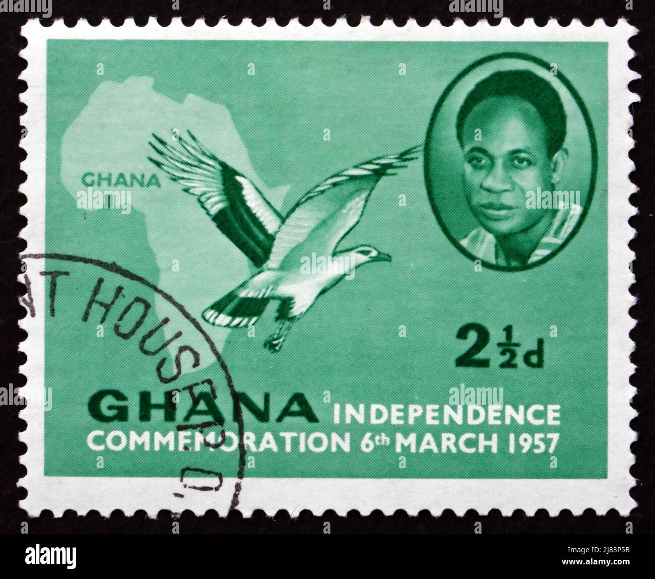 GHANA - CIRCA 1957: a stamp printed in Ghana shows Kwame Nkrumah, the First President of Ghana, Map of Africa and Palm-nut Vulture, circa 1957 Stock Photo