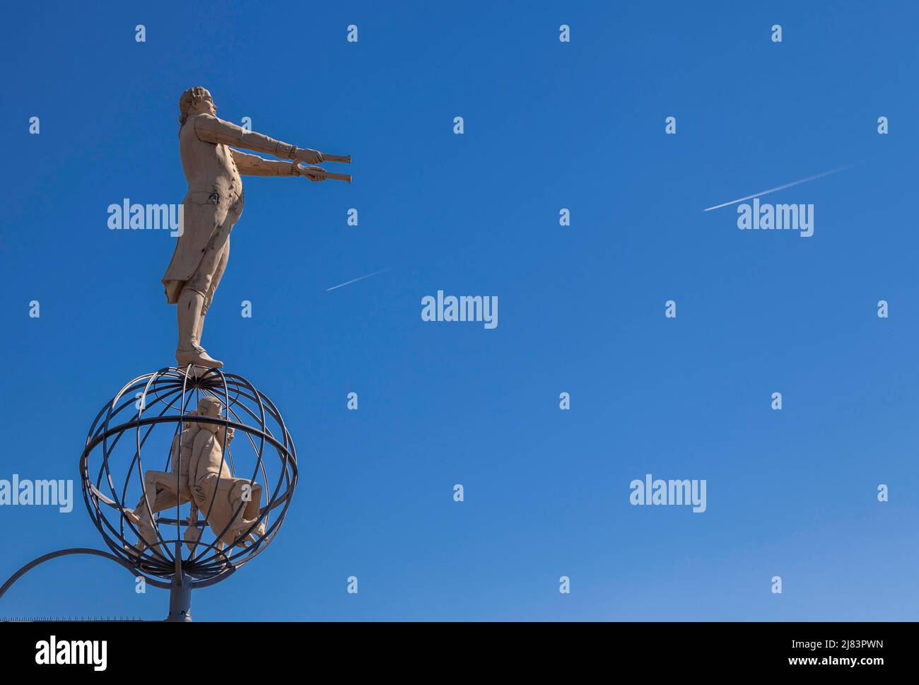 Artwork by Peter Lenk, figures at the magic column in the harbour of Mersburg, Baden-Wuerttemberg, Germany Stock Photo