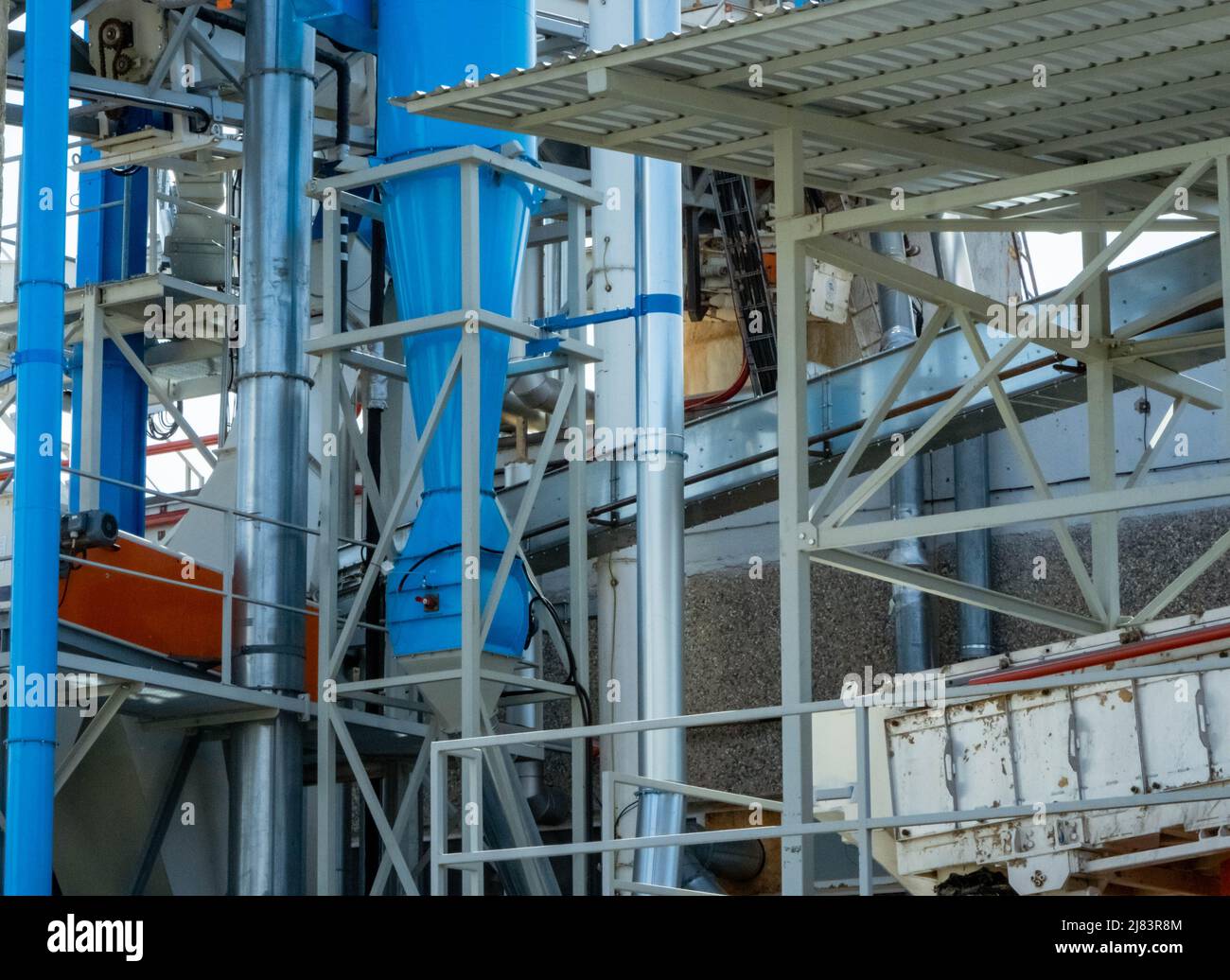 Aerial image of a woodworking plant with piles of logs around. Stock Photo