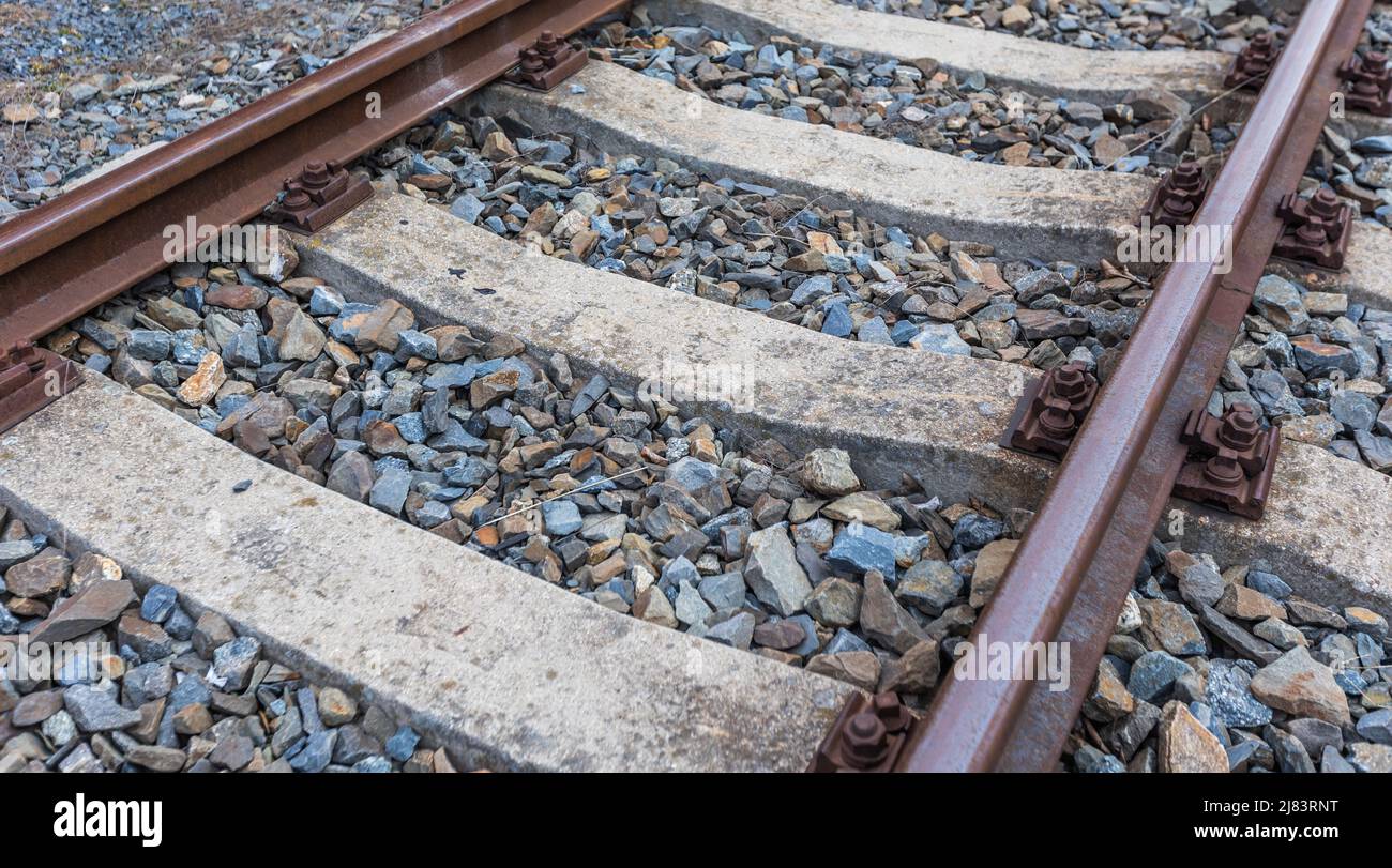 A railway tracks, gravel and screws, a transport concept Stock Photo