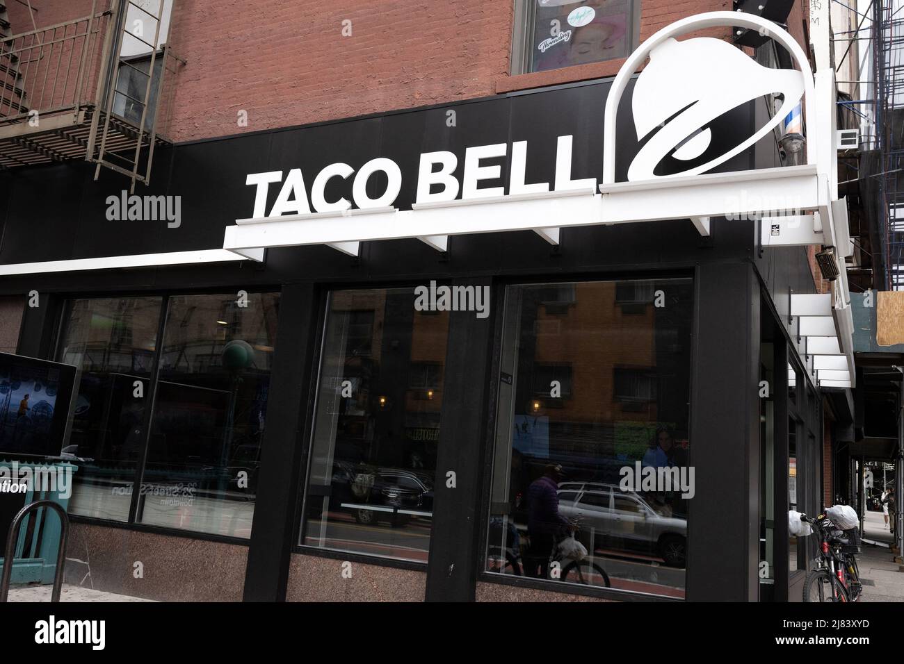 A shop sign of TACO BELL, on May 07, 2022 in NewYork City, USA. Photo