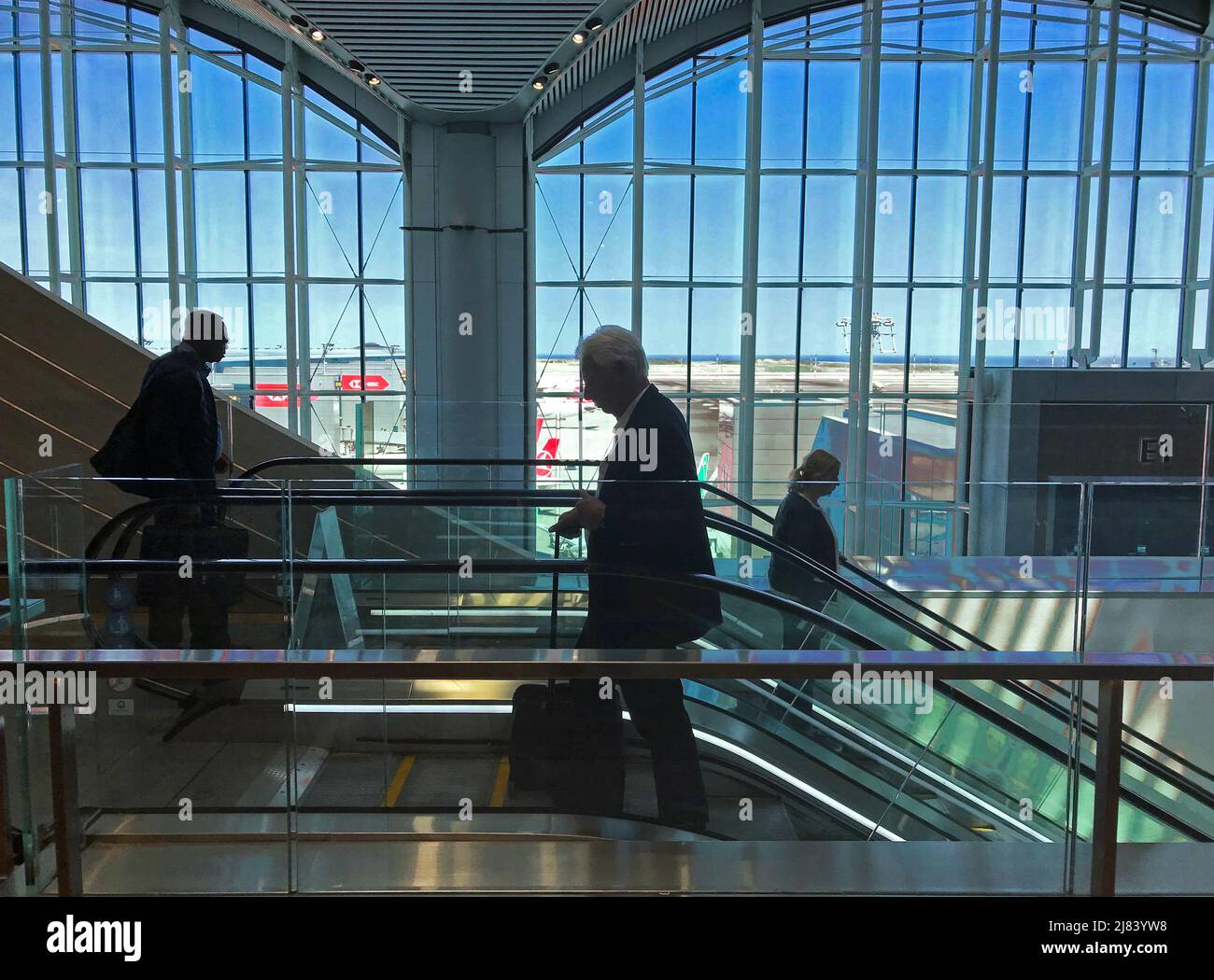 Passengers inside the Istanbul Airport in Turkey Stock Photo