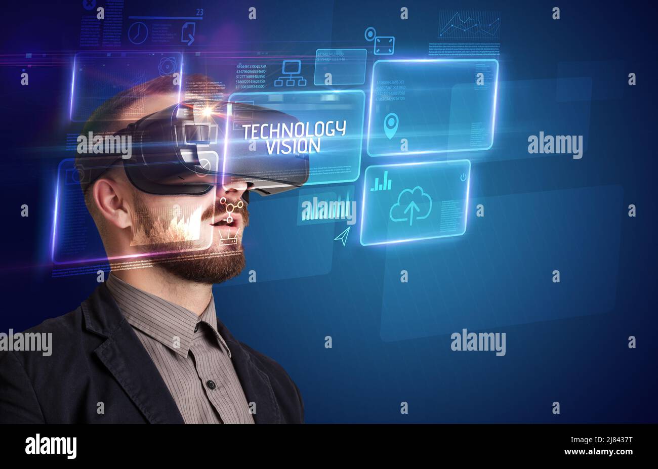 Businessman looking through Virtual Reality glasses, tech concept Stock ...