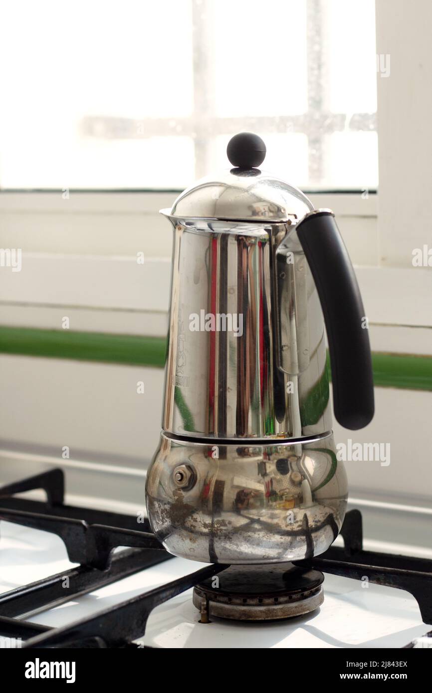 italian coffee maker on gas stove top in the kitchen Stock Photo Alamy