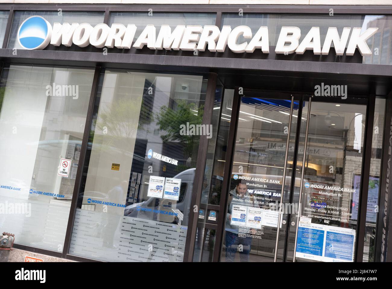 A shop sign of WOORI AMERICA BANK, on May 07, 2022 in NewYork City