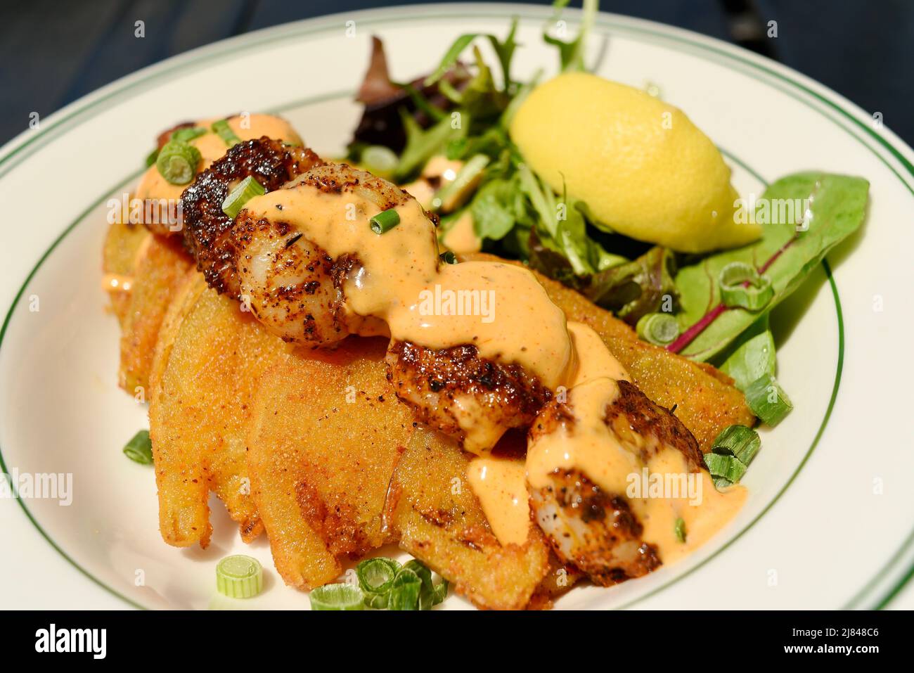 Fried green tomatoes with blackened gulf shrimp at Ginny Lane Bar