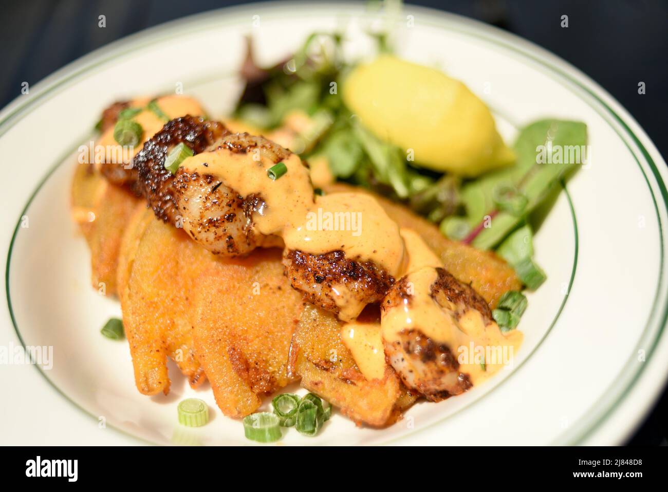 Fried green tomatoes with blackened gulf shrimp at Ginny Lane Bar