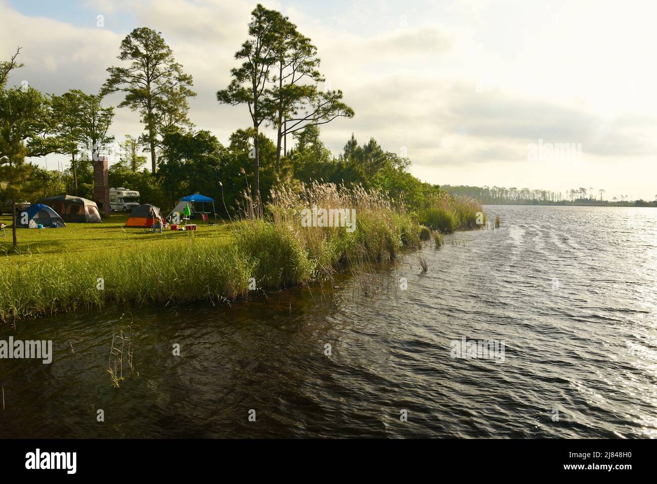 Cabin rental units and camping, water edge, along Lake Shelby in Gulf