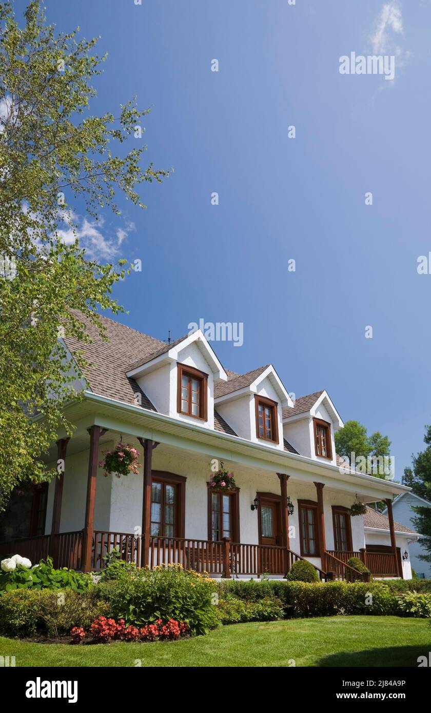 Replica of old 1860s Canadiana cottage style white stucco home with ...