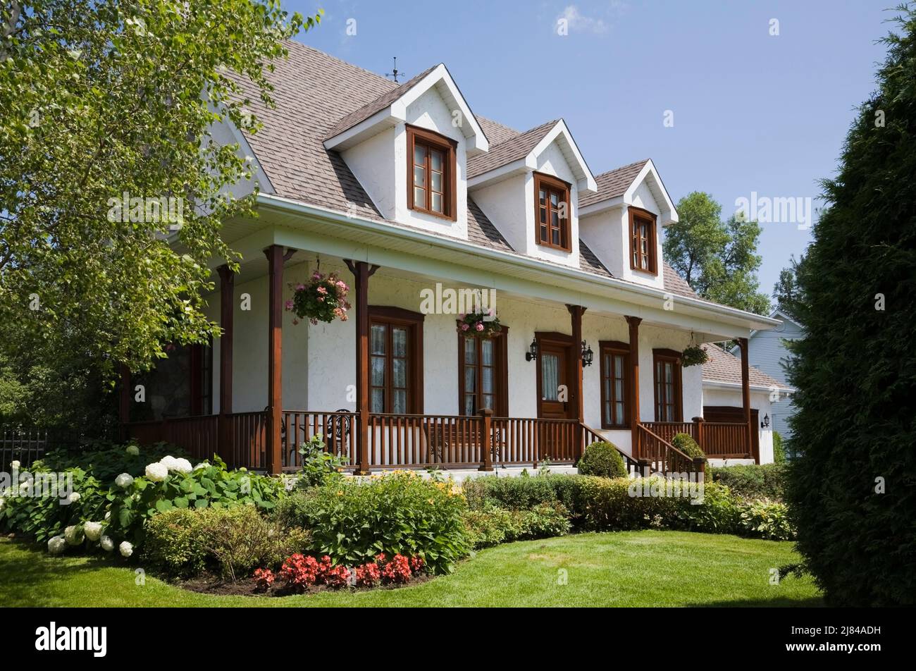 Replica of old 1860s Canadiana cottage style white stucco home with ...