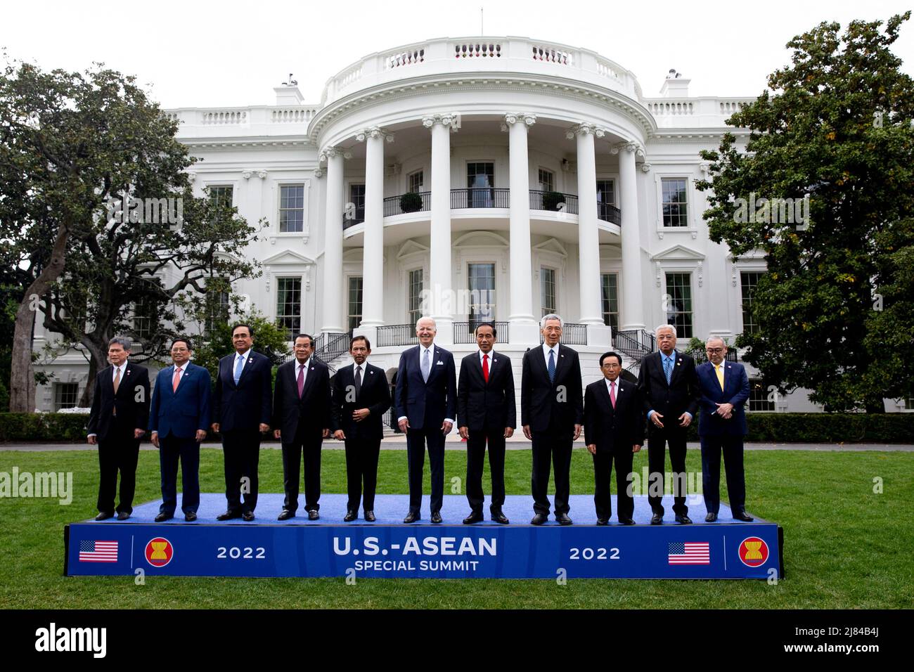 Washington, DC, USA, 12 May 2022. US President Joe Biden (C) poses with leaders of the US-ASEAN Special Summit during a family photo on the South Lawn of the White House in Washington, DC, USA, 12 March 2022. Also in this picture (L to R); Dato Lim Jock Hoi, Secretary-General of the Association for Southeast Asian Nations; Prime Minister of Vietnam Pham Minh Chinh; Prime Minister of Thailand Prayut Chan-o-cha; Prime Minister of Cambodia Hun Sen; Sultan Haji Hassanal Bolkiah of Brunei; President of Indonesia Joko Widodo; Prime Minister of the Republic of Singapore Lee Hsien Loong; Prime Ministe Stock Photo