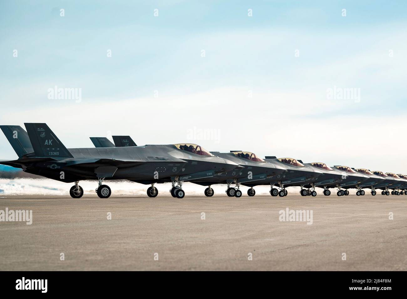 Eielson Air Force Base, Alaska, USA. 25th Mar, 2022. A formation of 42 F-35A Lightning II's, 354th Fighter Wing, during a routine readiness exercise at Eielson Air Force Base, Alaska, March 25, 2022. The capabilities demonstration represents the culmination of the dedicated efforts of the 354th Fighter Wing, with each Airman providing vital contributions to ensure Team Eielson is ready to deliver airpower anytime, anywhere. Credit: U.S. Air Force /ZUMA Press Wire Service/ZUMAPRESS.com/Alamy Live News Stock Photo