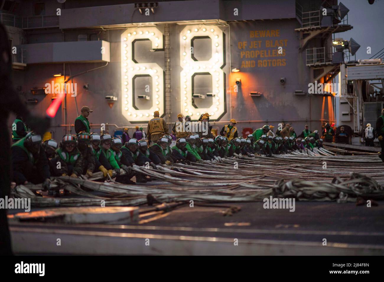 Bremerton, Washington, USA. 4th May, 2022. Sailors assigned to the aircraft carrier USS Nimitz (CVN 68) conduct drills on the flight deck for a tailored ship's training availability/final evaluation problem (TSTA/FEP) at Naval Base Kitsap-Bremerton. TSTA/FEP is a multi-phase training evolution designed to give the crew a solid foundation of unit-level operating proficiency and to enhance the ship's ability to self-train. Nimitz is in port preparing for future operations. Credit: U.S. Navy/ZUMA Press Wire Service/ZUMAPRESS.com/Alamy Live News Stock Photo