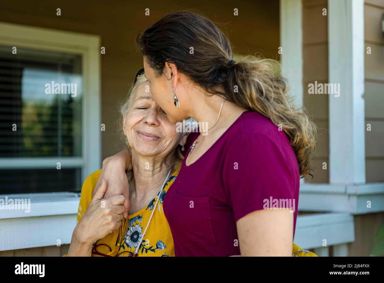 Travis Air Force Base, California, USA. 30th Apr, 2022. U.S. Air Force Capt. Zlatoslava Karga, right, 60th Operational Medical Readiness Squadron mental health psychiatrist, embraces her mother, Luba, at their home in Vacaville, California, April 30, 2022. Karga was raised in Kyiv, immigrated to the U.S. in 2001 and commissioned into the Air Force in 2019. When the war broke out in Ukraine, she and her husband evacuated her mother to the U.S. Credit: U.S. Air Force/ZUMA Press Wire Service/ZUMAPRESS.com/Alamy Live News Stock Photo
