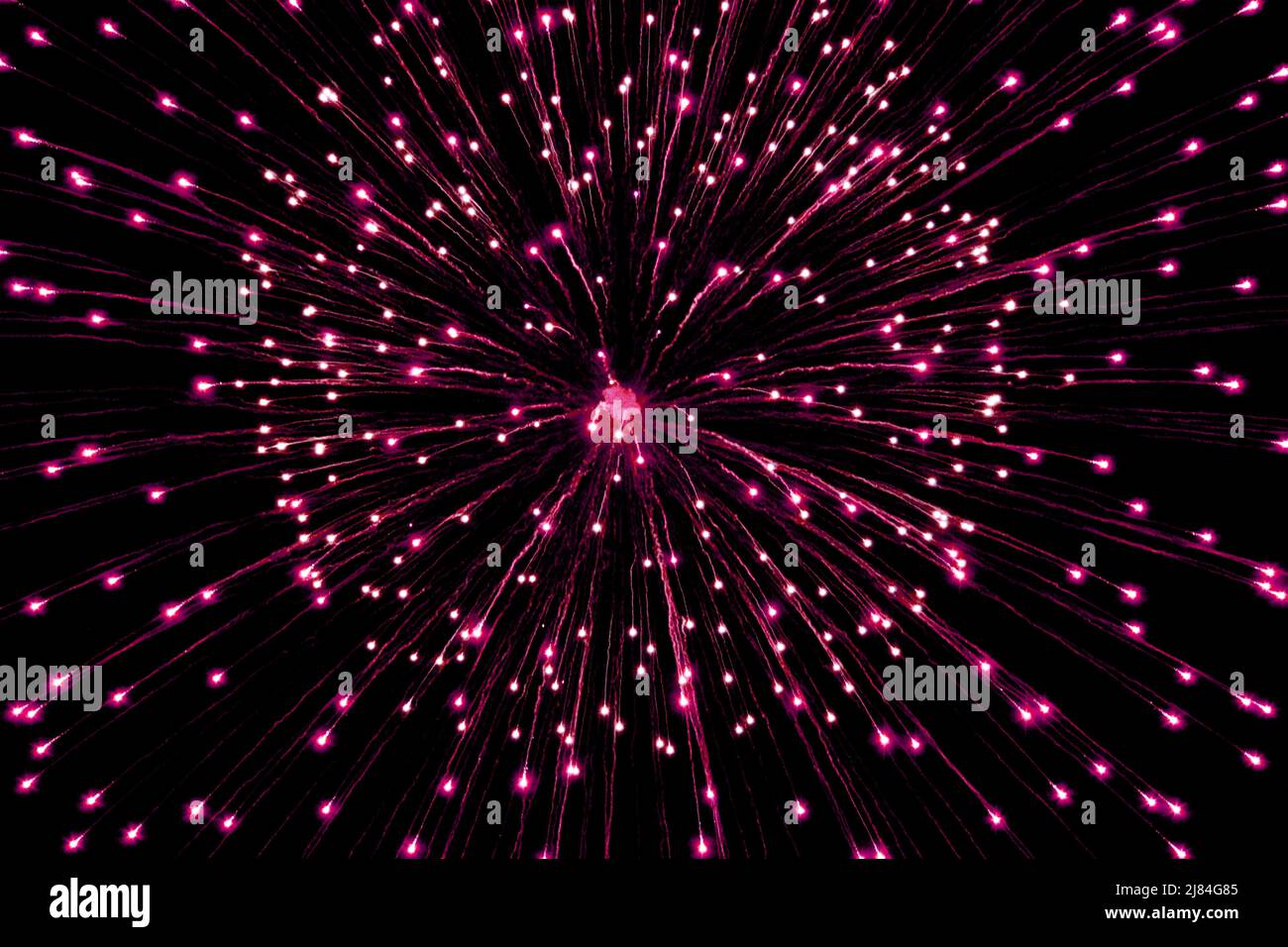 Close up photo of fireworks exploding in the night sky Stock Photo