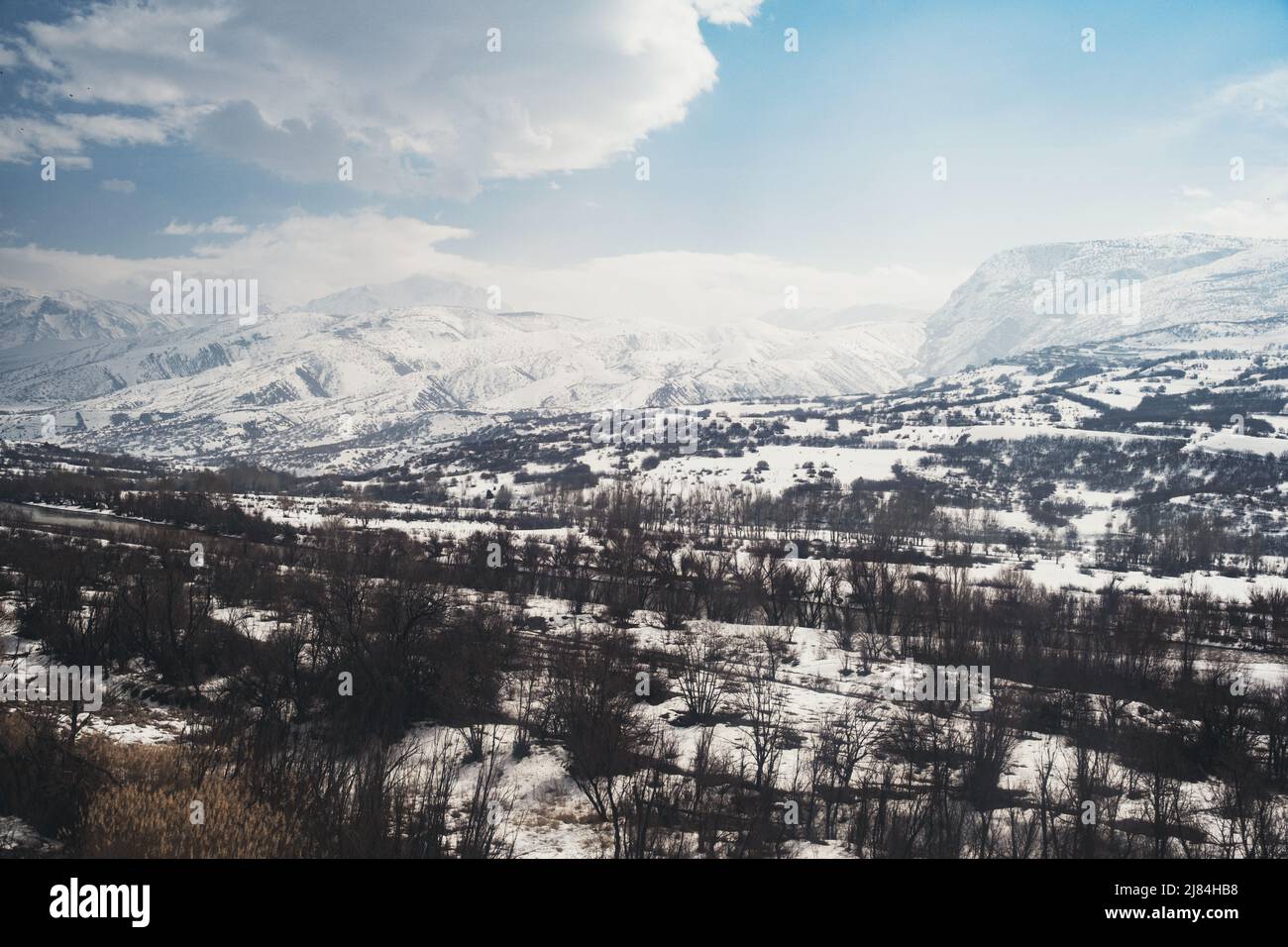 Landscape of a mountain with snow and clouds Stock Photo - Alamy