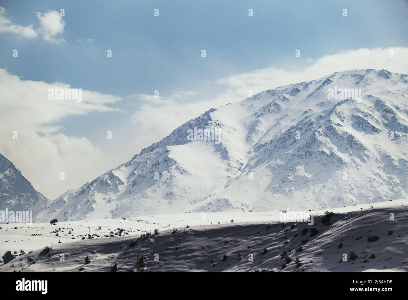 Landscape of a mountain with snow and clouds Stock Photo - Alamy