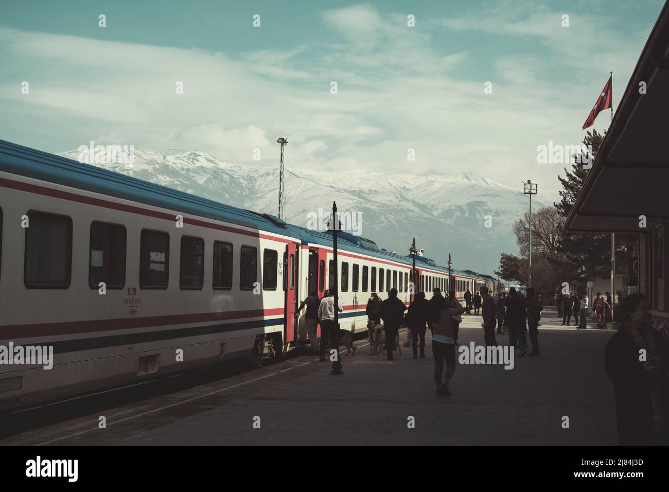 Erzincan, Turkey - February 22, 2022: Eastern express train and the passengers at the Erzincan train station in Erzincan Turkey. Stock Photo