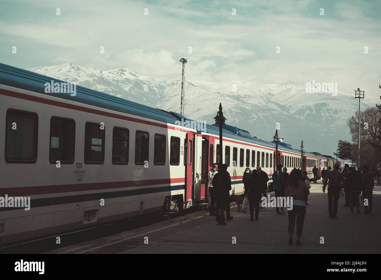 Erzincan, Turkey - February 22, 2022: Eastern express train and the passengers at the Erzincan train station in Erzincan Turkey. Stock Photo