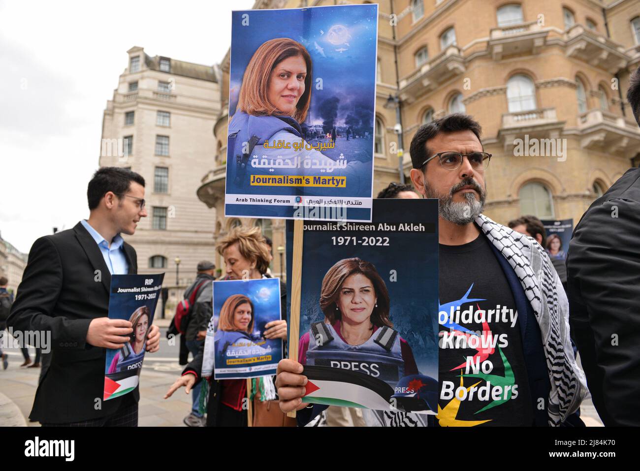 London, UK. 12th May, 2022. Protesters hold placards during the vigil. Demonstrators gathered in a solidarity protest in front of BBC Headquarters in London to condemn the killing of Al Jazeera journalist, Shireen Abu Akleh. (Photo by Thomas Krych/SOPA Images/Sipa USA) Credit: Sipa USA/Alamy Live News Stock Photo