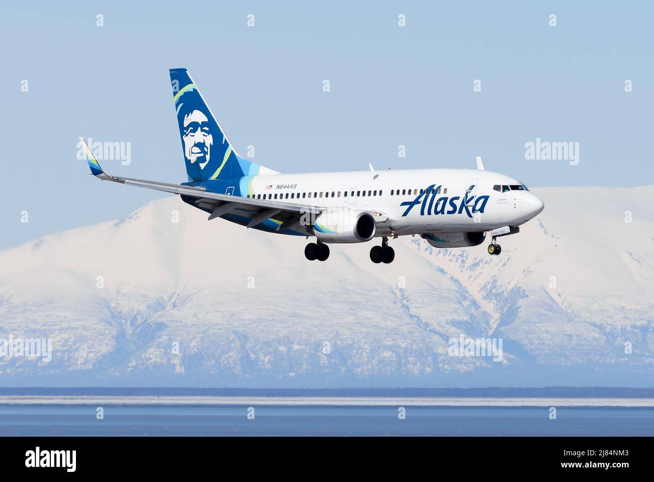 Alaska Airlines Boeing 737 airplane arriving in Anchorage, Alaska. Airline with B737 aircraft. Plane 737-700 of Alaska Airlines N644AS. Stock Photo