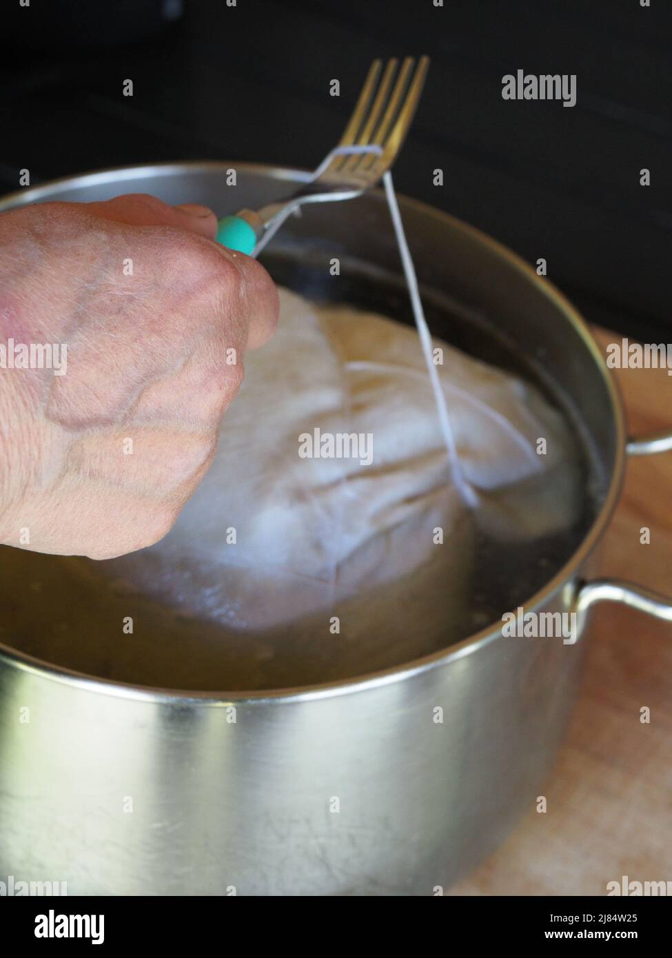 Cooking Cappello del Prete traditional boiled meat from Emilia Romagna and Piedmont, Italy Stock Photo