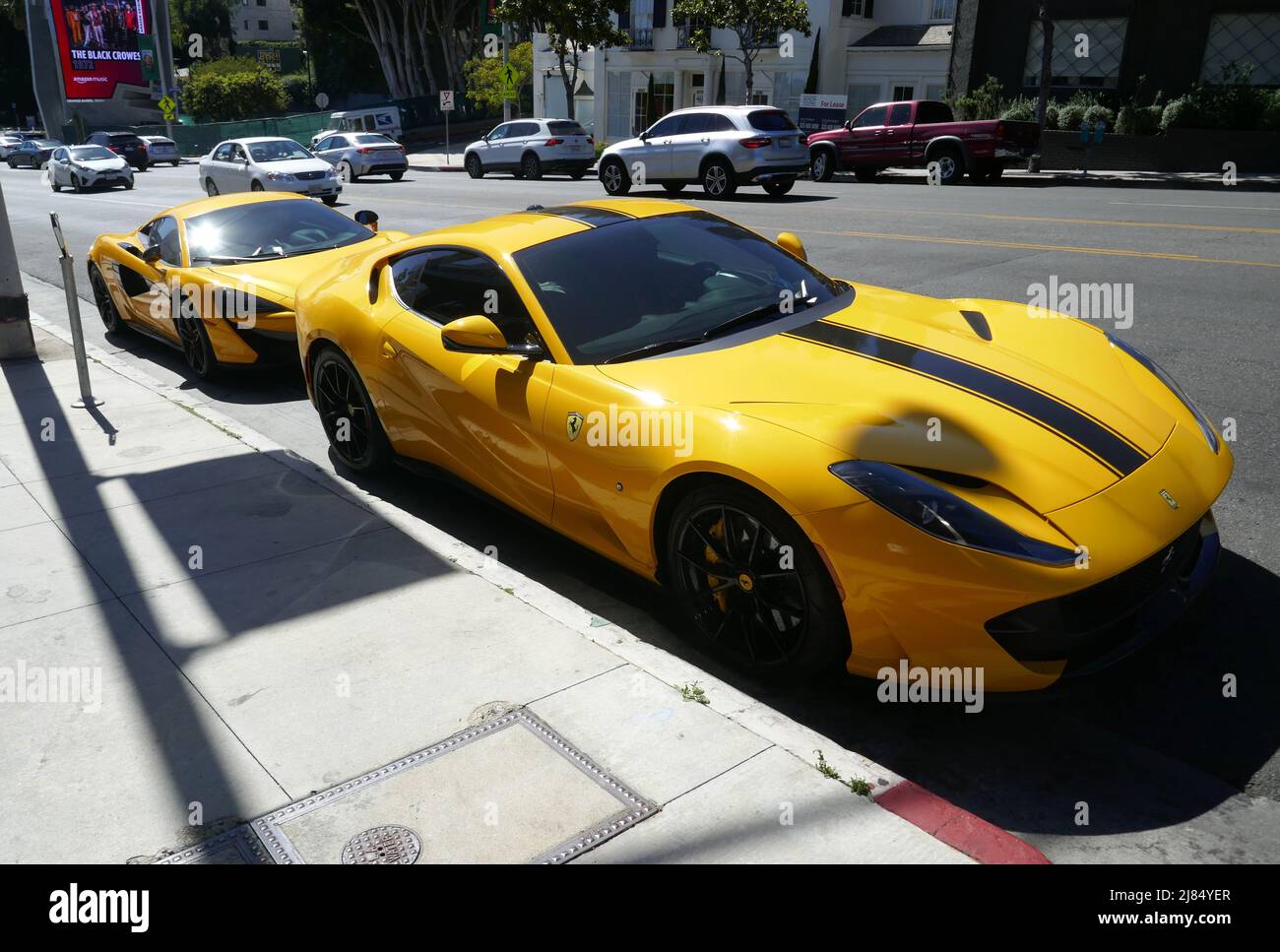 Los Angeles, California, USA 12th May 2022 A general view of atmosphere of Yellow McLaren and Yellow Ferrari on Sunset Blvd on May 12, 2022 in Los Angeles, California, USA. Photo by Barry King/Alamy Stock Photo Stock Photo