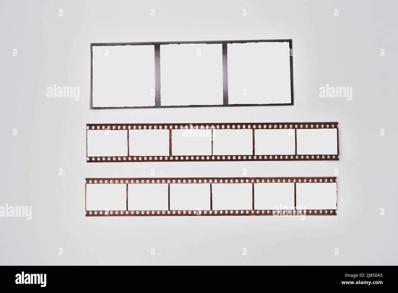 Retro film strip frames in blue tones with copy space Stock Photo