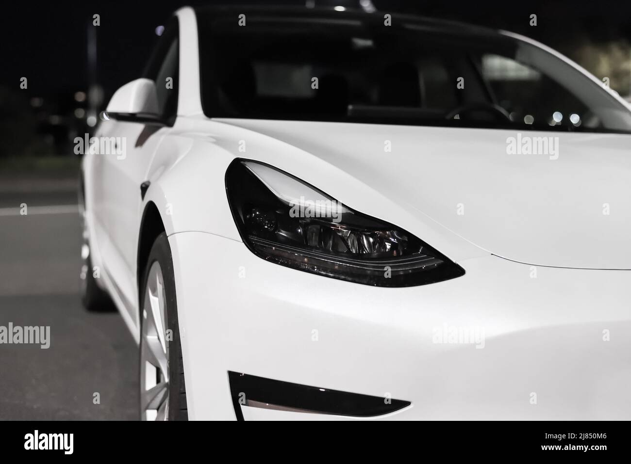 Front view of Tesla electric car. Design, exterior and appearance of white electric car of Tesla Motors automotive company: Riga, Latvia - September 2 Stock Photo