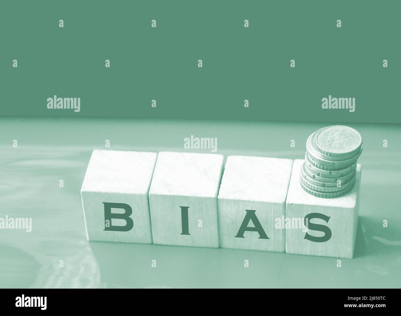 the word bias on wooden blocks on red. Social concept. Stock Photo