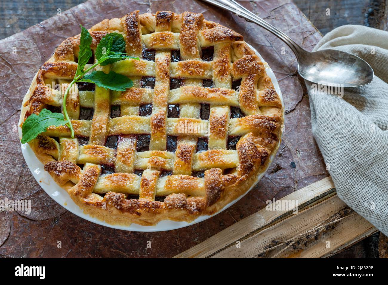 Classic homebaked cherry pie with lattice crust Stock Photo