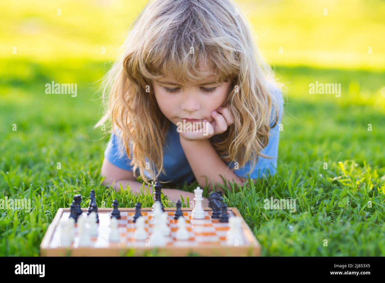 Clever Concentrated and Thinking Child while Playing Chess. Thinking Child.  Chess, Success and Winning Stock Image - Image of decisions, chess:  175817817