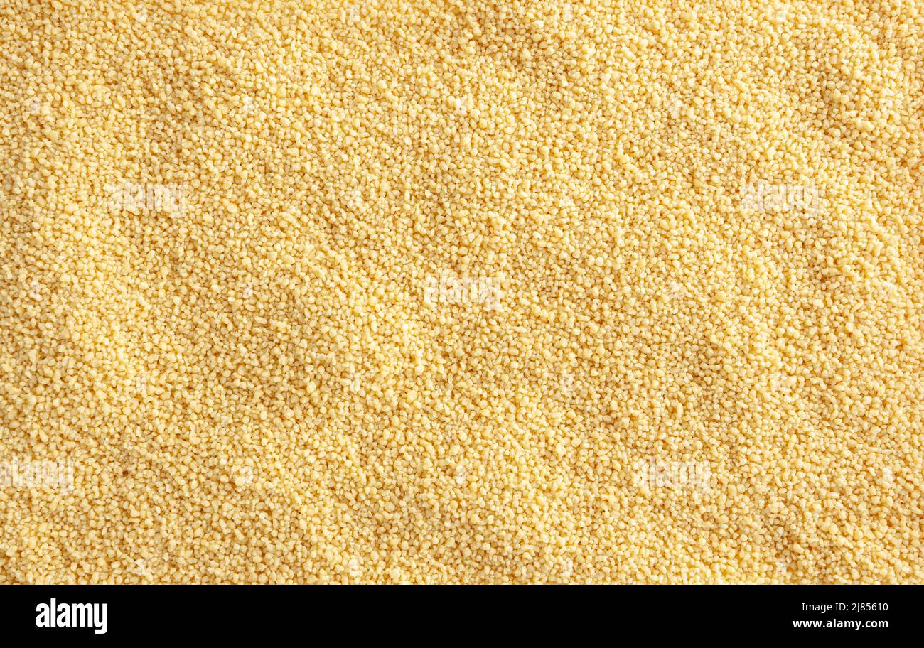 Uncooked cous cous background Stock Photo