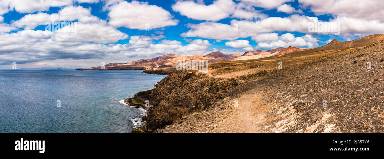 Panoramic view from Puerto Calero to Playa Quemada, Lanzarote, Spain with Fuerteventura in the distance Stock Photo