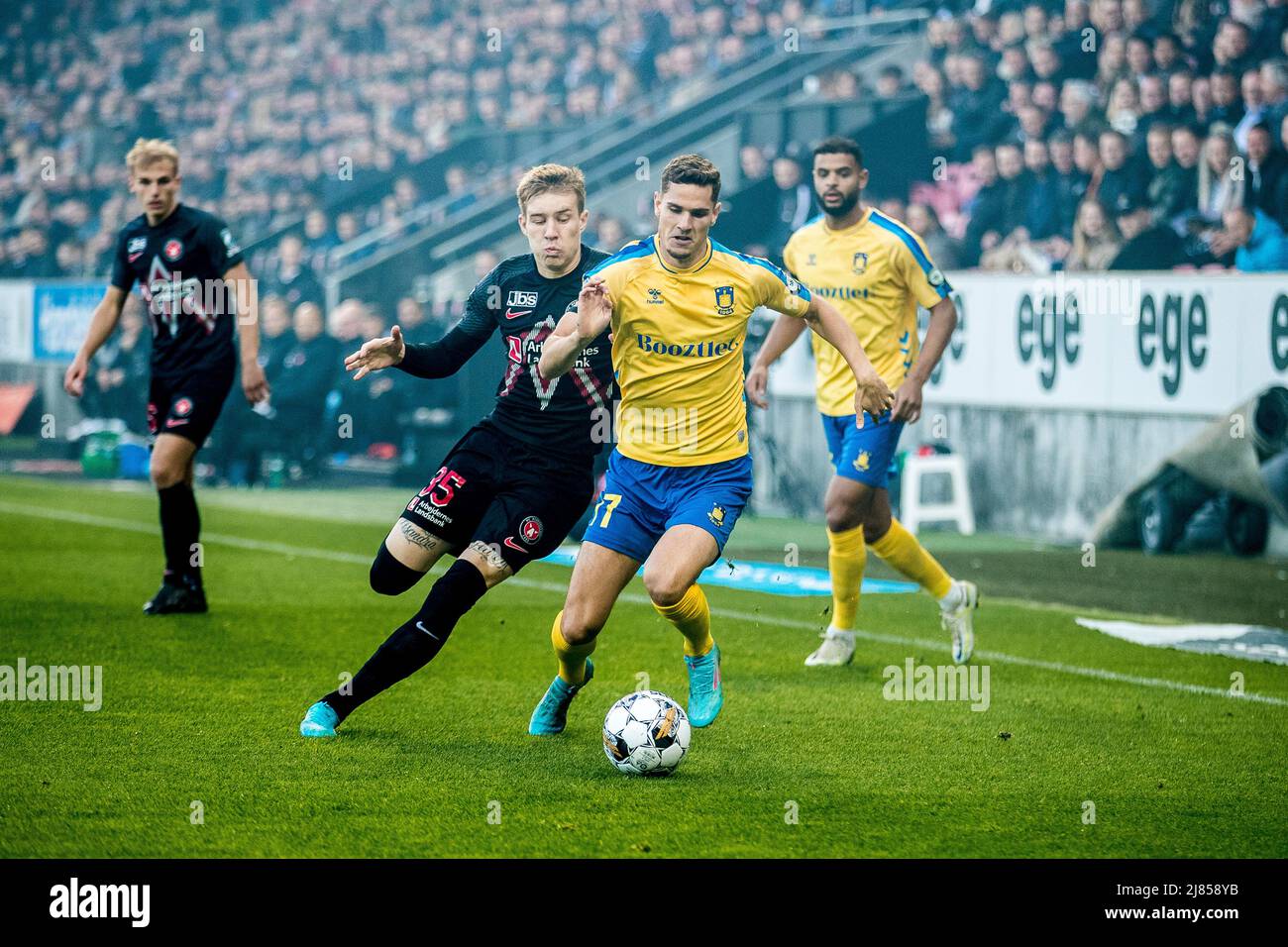 Herning, Denmark. 12th May, 2022. Andreas Bruus (17) of Broendby IF and Charles (35) of FC Midtjylland seen during the 3F Superliga match between FC Midtjylland and Broendby IF at MCH Arena in Herning. (Photo Credit: Gonzales Photo/Alamy Live News Stock Photo