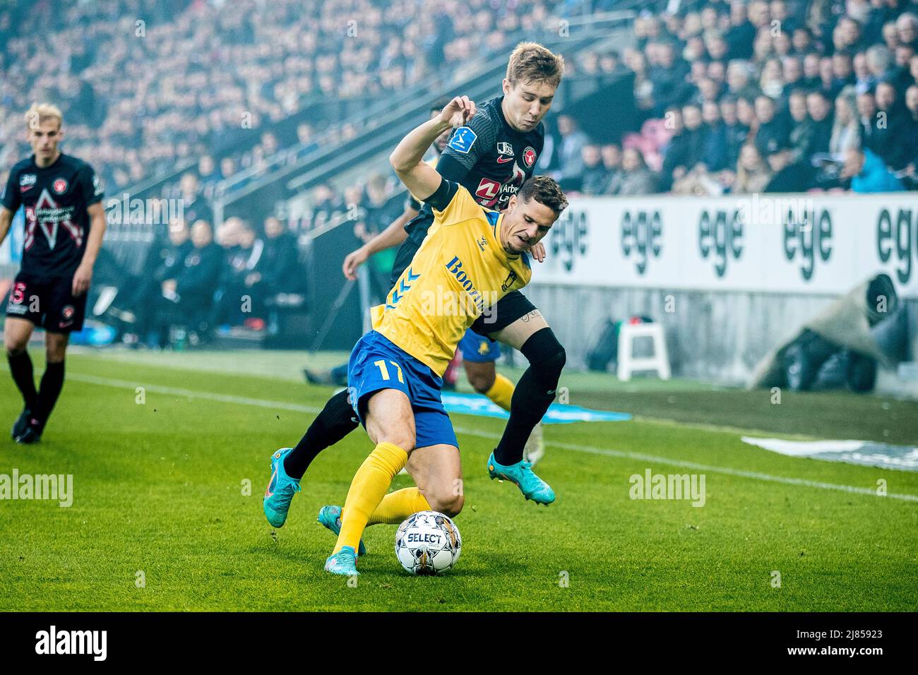 Herning, Denmark. 12th May, 2022. Andreas Bruus (17) of Broendby IF and Charles (35) of FC Midtjylland seen during the 3F Superliga match between FC Midtjylland and Broendby IF at MCH Arena in Herning. (Photo Credit: Gonzales Photo/Alamy Live News Stock Photo