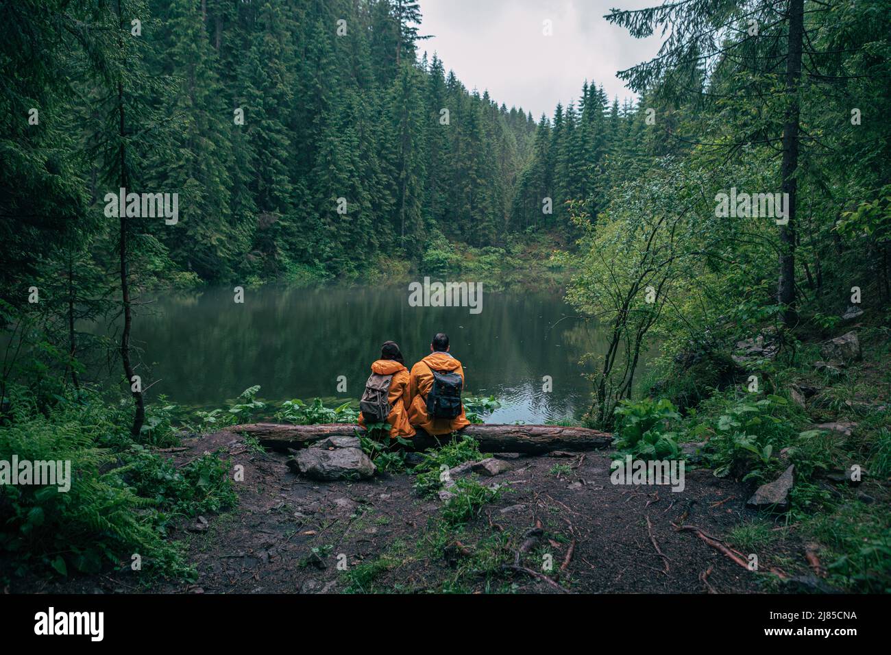Couple hikers in yellow hi-res stock photography and images - Alamy