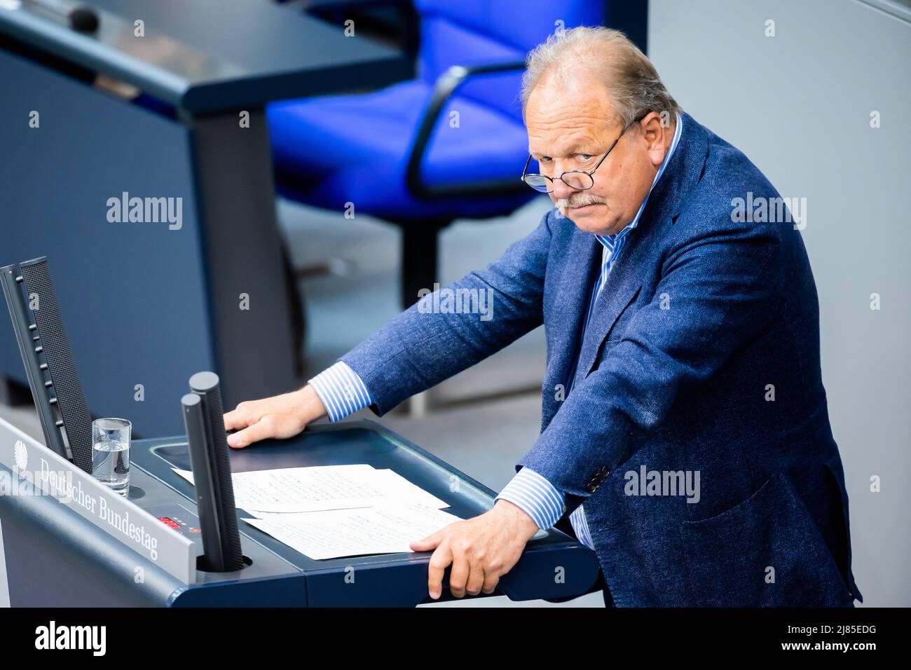 Berlin, Germany. 13th May, 2022. Frank Bsirske (Bündnis 90/Die Grünen), member of the German Bundestag, speaks in the plenary session of the German Bundestag. The agenda includes deliberations on the 2022 pension adjustment, the abolition of the ban on abortion advertising, the suspension of Hartz IV sanctions and the reduction of the energy tax on fuels. Credit: Christoph Soeder/dpa/Alamy Live News Stock Photo